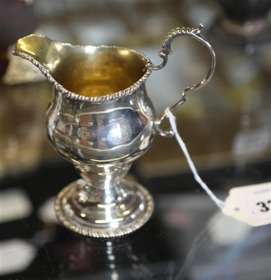 George II silver helmet-shaped cream jug, with ropetwist rim and foot, London 1759, prob George Smith I(-)